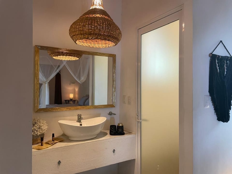 Deluxe Bungalow, Lagoon View | Bathroom | Shower, towels, soap, shampoo