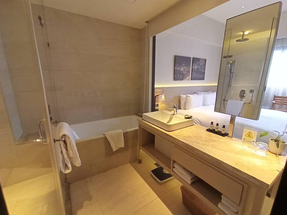 City View Double Room With Balcony | Bathroom | Separate tub and shower, deep soaking tub, rainfall showerhead