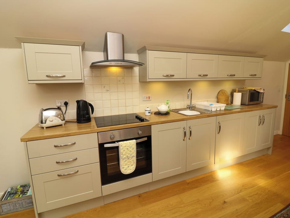Fridge, microwave, toaster, cookware/dishes/utensils