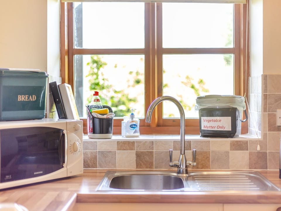 Fridge, microwave, cookware/dishes/utensils