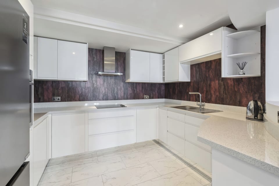 Fridge, electric kettle, toaster, cookware/dishes/utensils