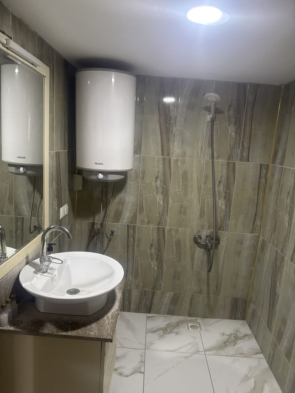 Standard room with 3 beds for max 4 people | Bathroom | Shower, slippers, towels, soap