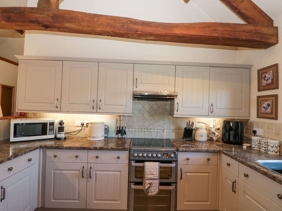Fridge, microwave, toaster, cookware/dishes/utensils