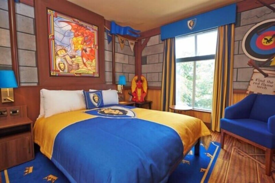 Knights & Dragons Deluxe Room at Castle Hotel | Desk, laptop workspace, blackout drapes, iron/ironing board