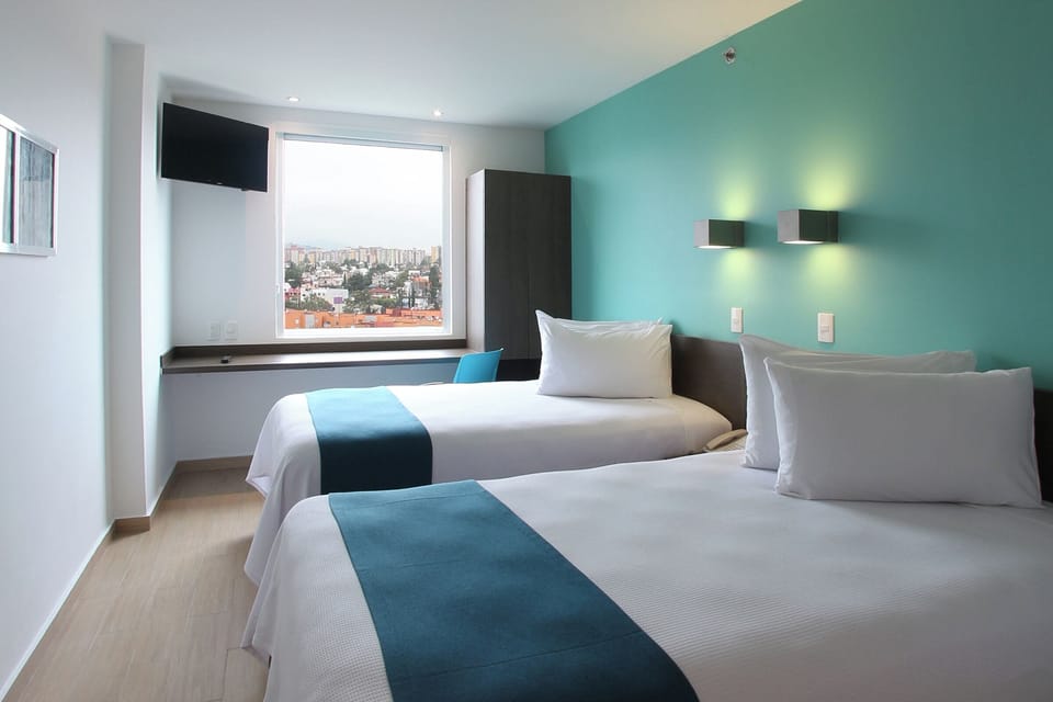 Superior Twin Room, 2 Twin Beds, City View | In-room safe, desk, free WiFi, bed sheets