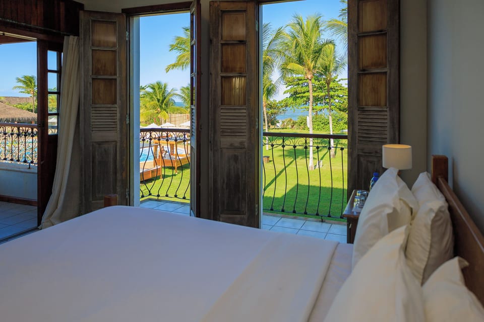Principal Frente Mar Quádruplo Camas Casal | Minibar, in-room safe, blackout drapes, individually decorated