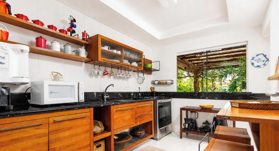 Villa | Private kitchen | Fridge, microwave, oven, stovetop