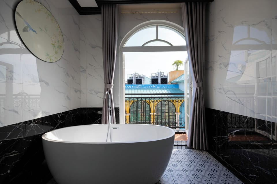 Family Suite, Balcony, Beach View | Bathroom | Hair dryer, slippers, bidet, towels