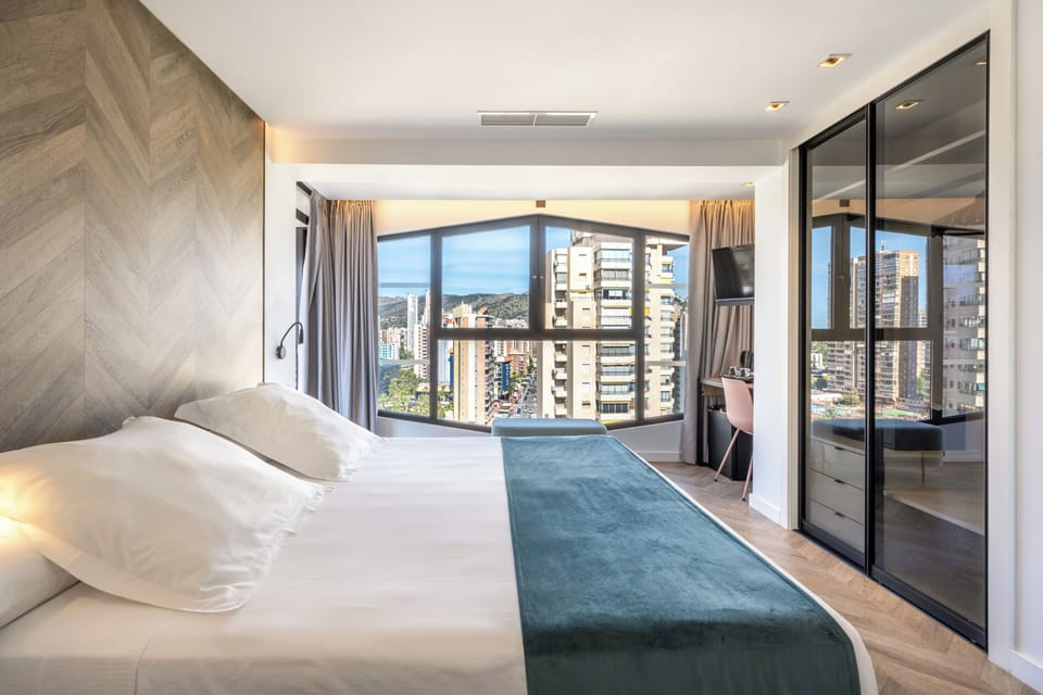 City Double Room | Minibar, in-room safe, individually decorated, individually furnished