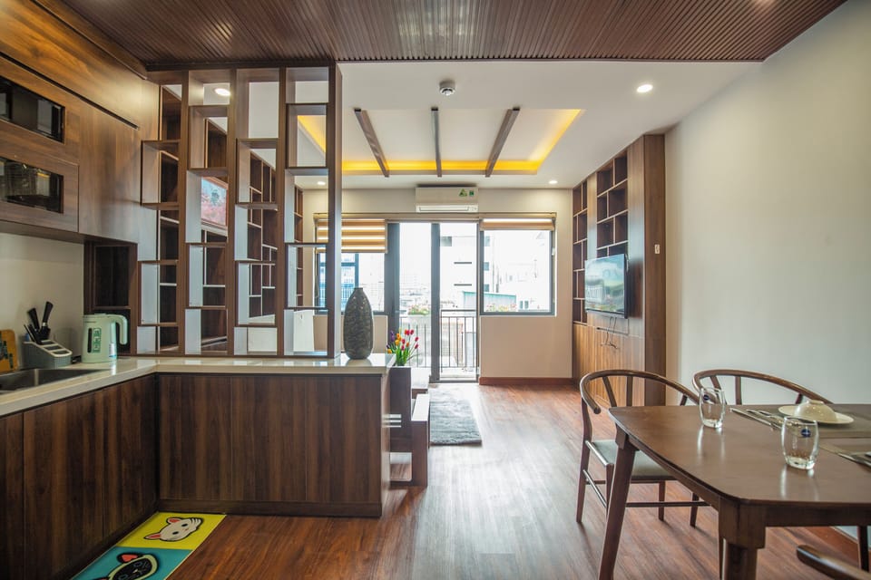 Deluxe Apartment, City View | Living area | 50-inch flat-screen TV with cable channels