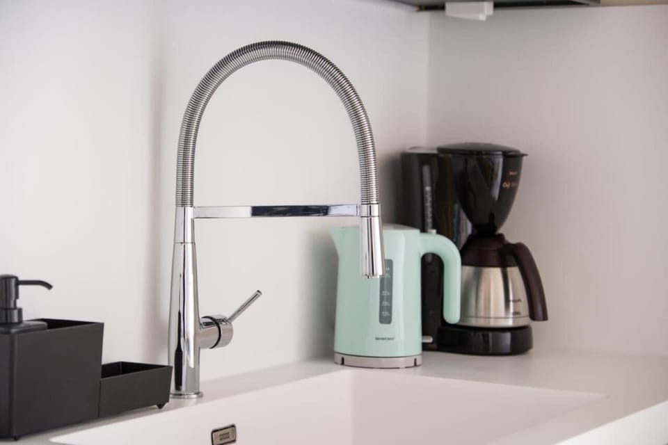 Family Apartment, Balcony, City View | Private kitchen | Espresso maker, electric kettle, toaster