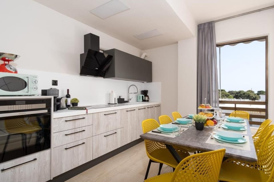Family Apartment, Balcony, City View | Private kitchen | Espresso maker, electric kettle, toaster
