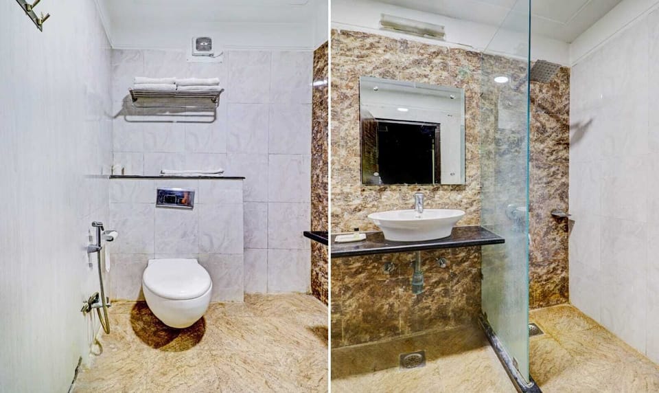 Executive Room | Bathroom | Shower, free toiletries, towels