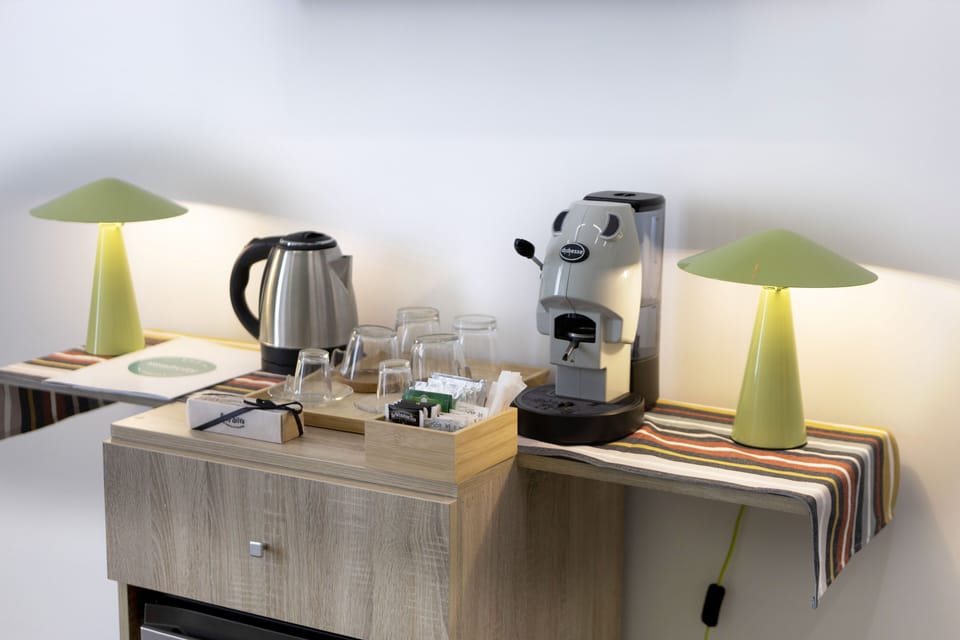 Standard Quadruple Room, City View | Minibar (free items), in-room safe, blackout drapes, cribs (free)