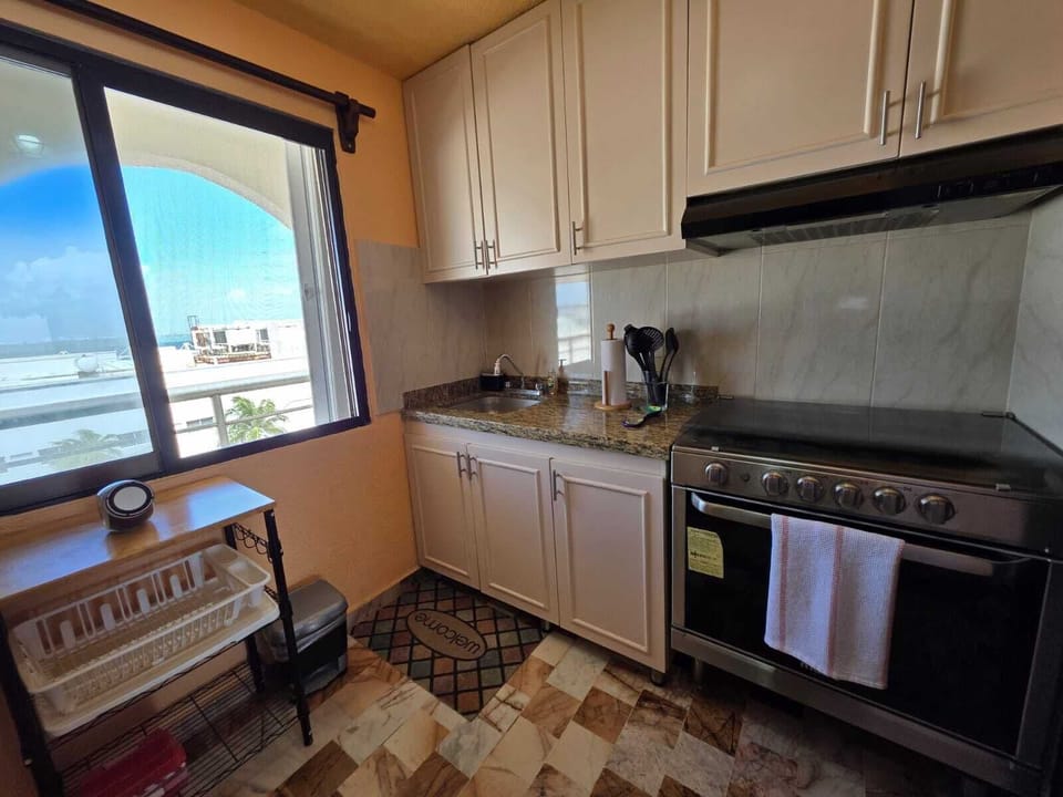 Family Apartment, Beach View | Private kitchen | Fridge, microwave