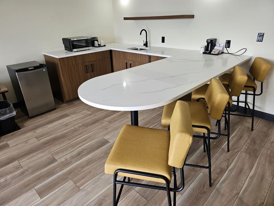 Junior Suite, Lake View | Living area | 43-inch TV with cable channels, streaming services