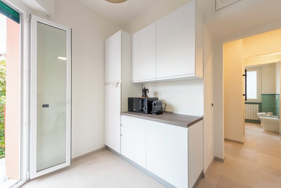 Apartment, 2 Bedrooms, Balcony | Private kitchen | Espresso maker, dining tables