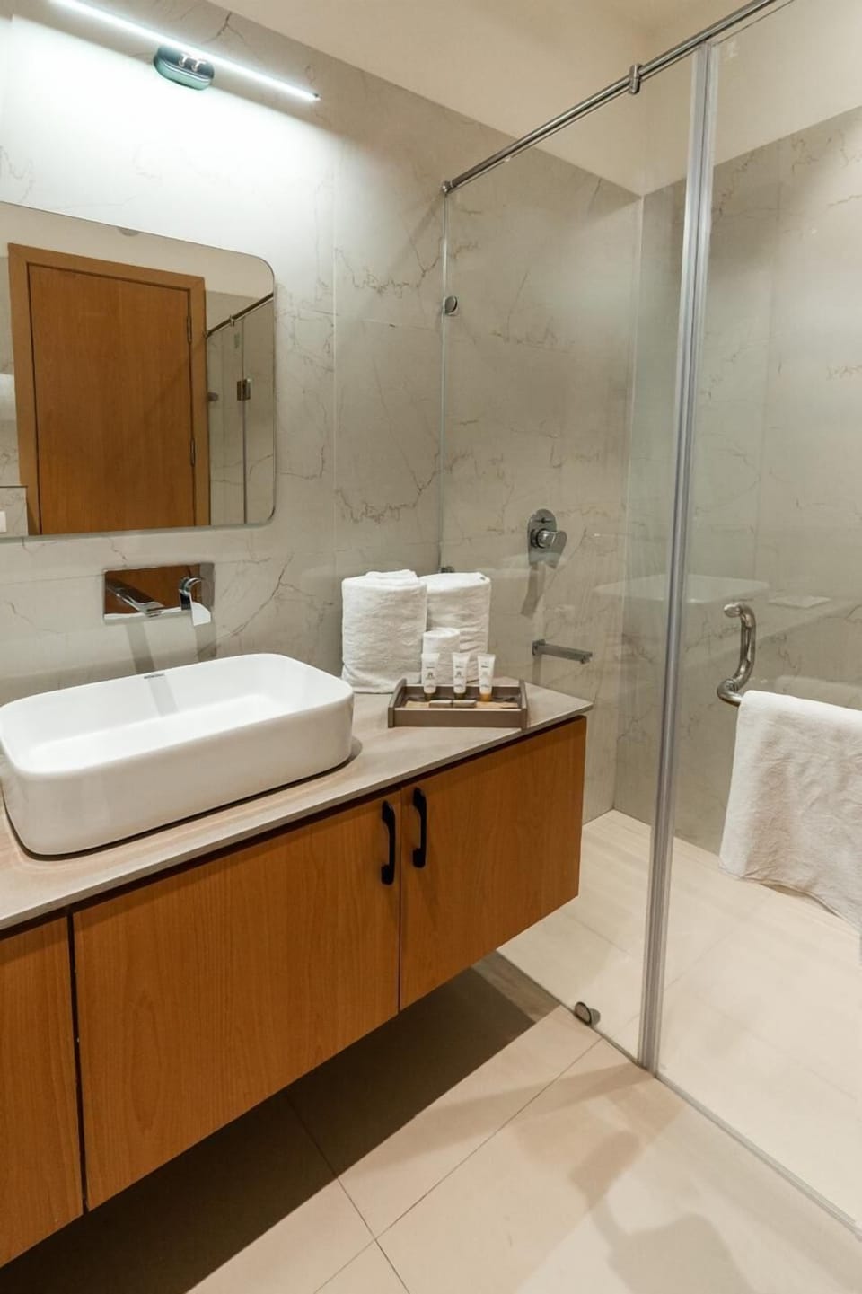 Shower, slippers, bidet, towels