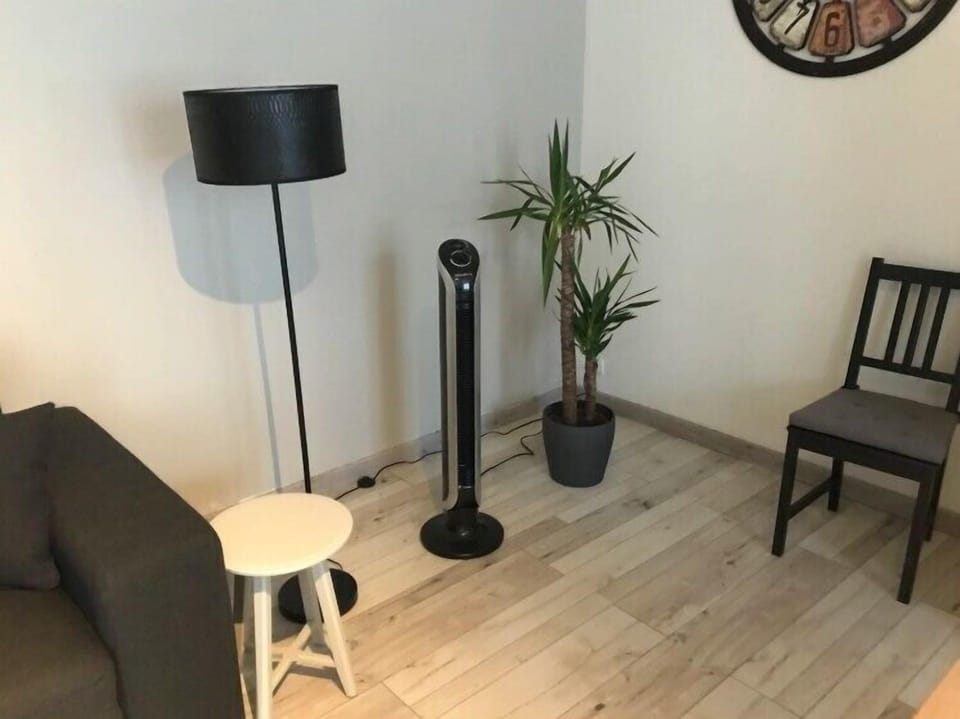 Classic Apartment, City View | Living area | TV