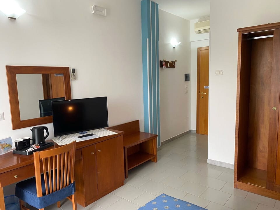 Deluxe Double Room, Balcony | In-room safe, desk, laptop workspace, blackout drapes