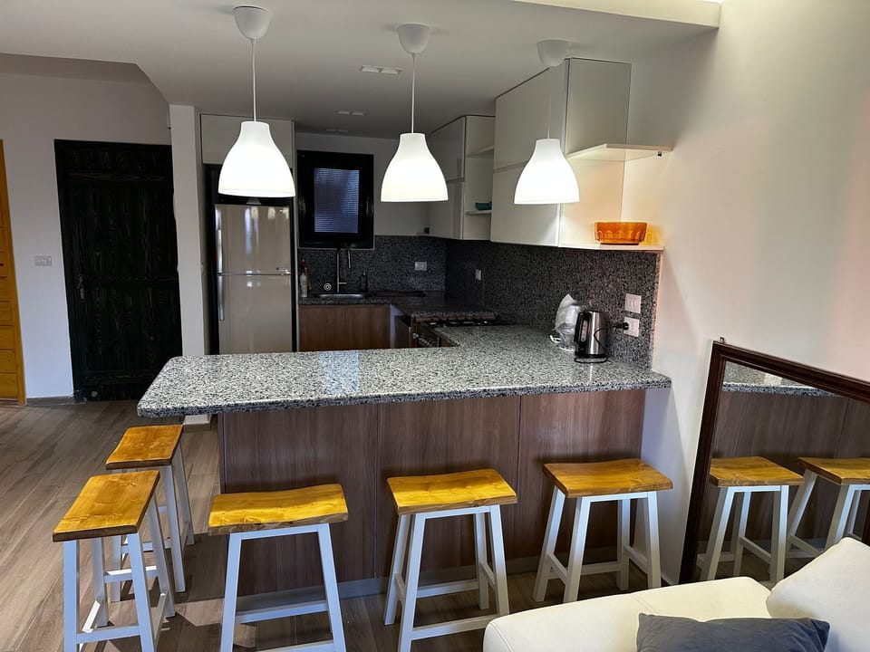 Chalet, Air conditioning, Pool View | Private kitchen | Microwave