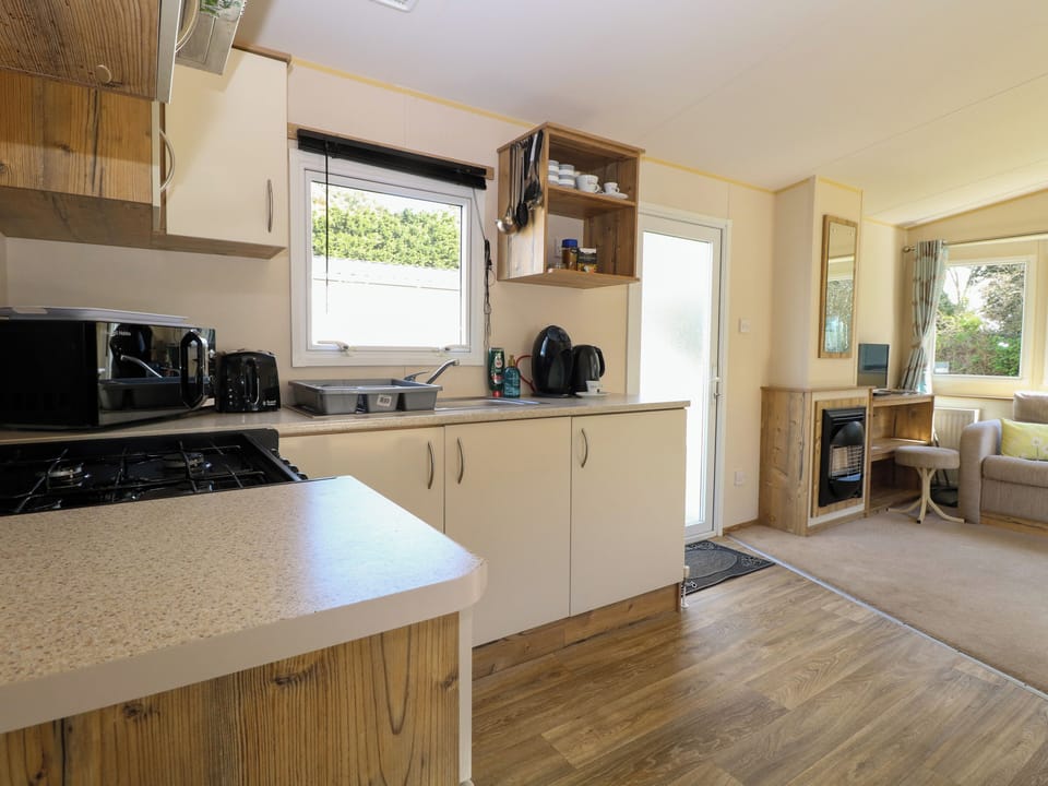 Fridge, microwave, toaster, cookware/dishes/utensils