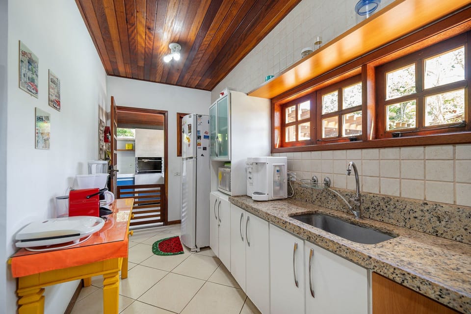 Villa | Private kitchen | Fridge, microwave, oven, stovetop