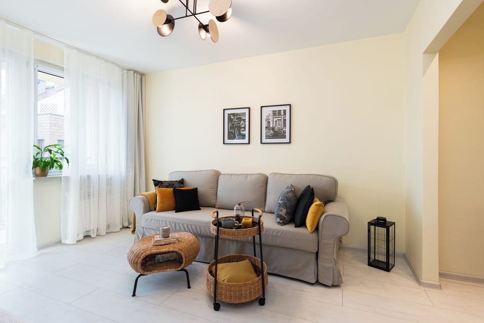 Comfort Apartment, City View | Living area | 50-inch Smart TV with cable channels, Netflix, streaming services