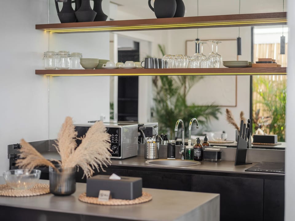 Deluxe Apartment | Private kitchen | Mini-fridge, dishwasher, coffee/tea maker, electric kettle
