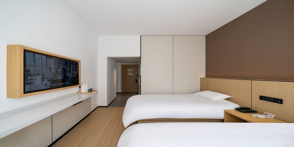 Basic Twin Room | Blackout drapes, iron/ironing board, free WiFi