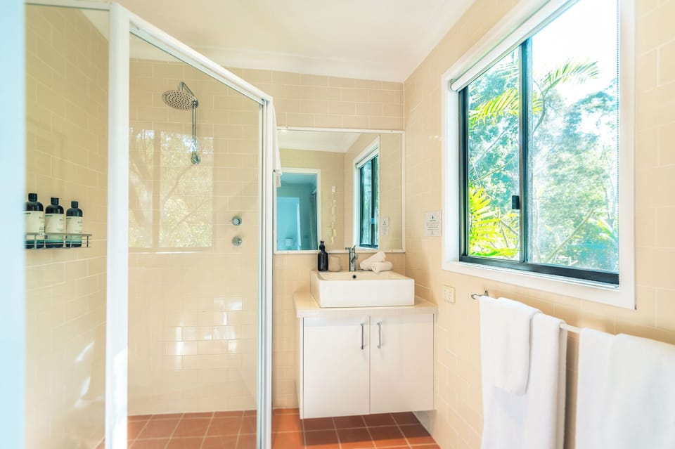 Studio, Lake View, Poolside | Bathroom | Shower, hair dryer, bathrobes, towels