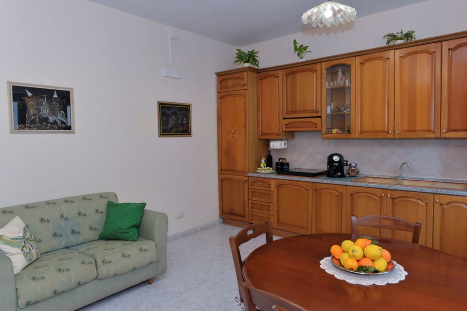 Comfort Apartment, Balcony, Partial Sea View | Living area | 36-inch flat-screen TV with digital channels