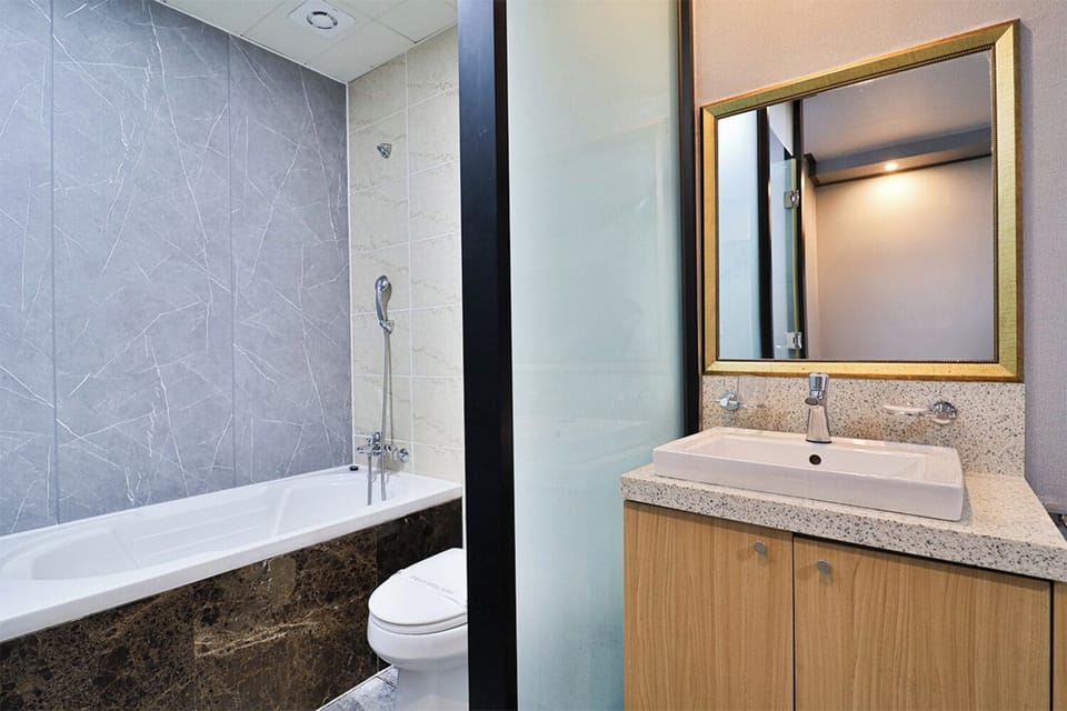 Standard Double (Breakfast not provided on Sunday) | Bathroom | Slippers, towels, shampoo, toilet paper