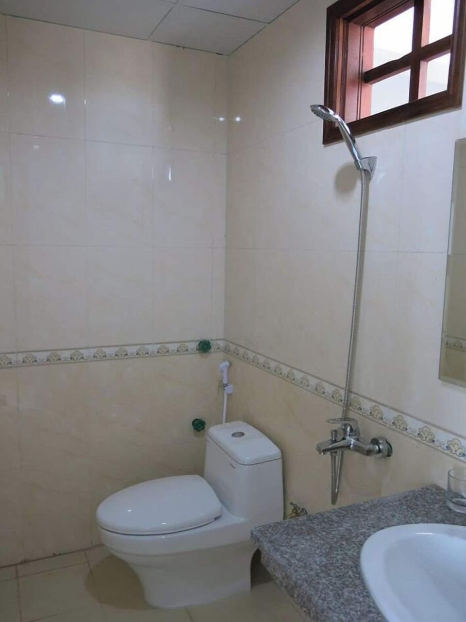 Triple Room | Bathroom | Shower, hair dryer, towels, soap