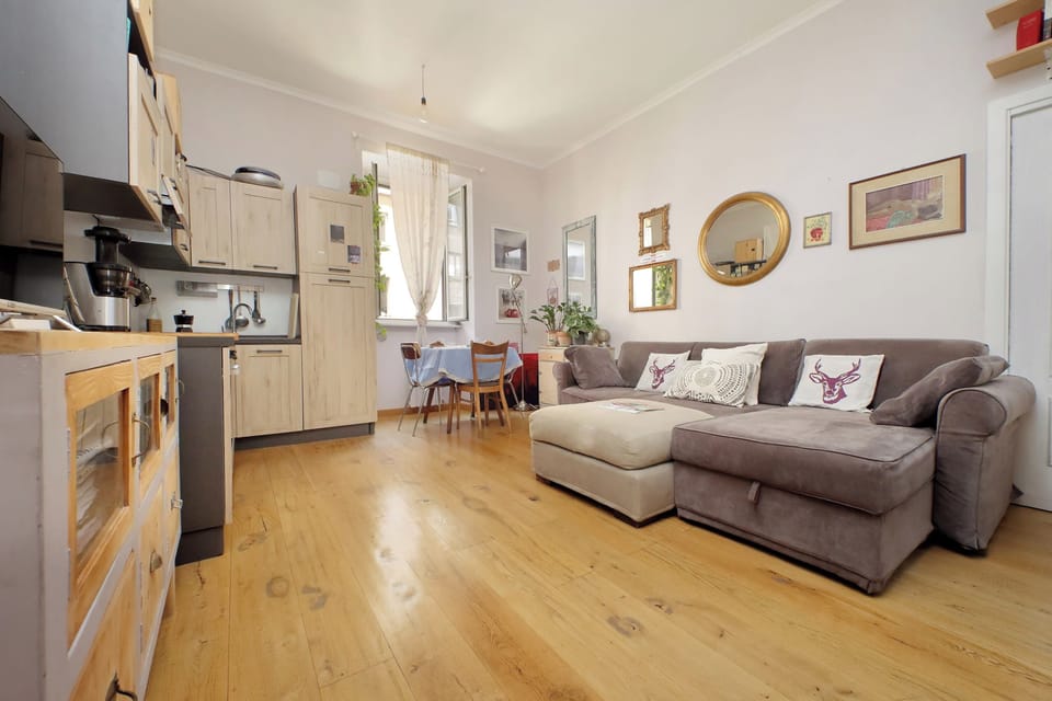 Apartment (1 Bedroom) | Living area | 32-inch Smart TV with cable channels
