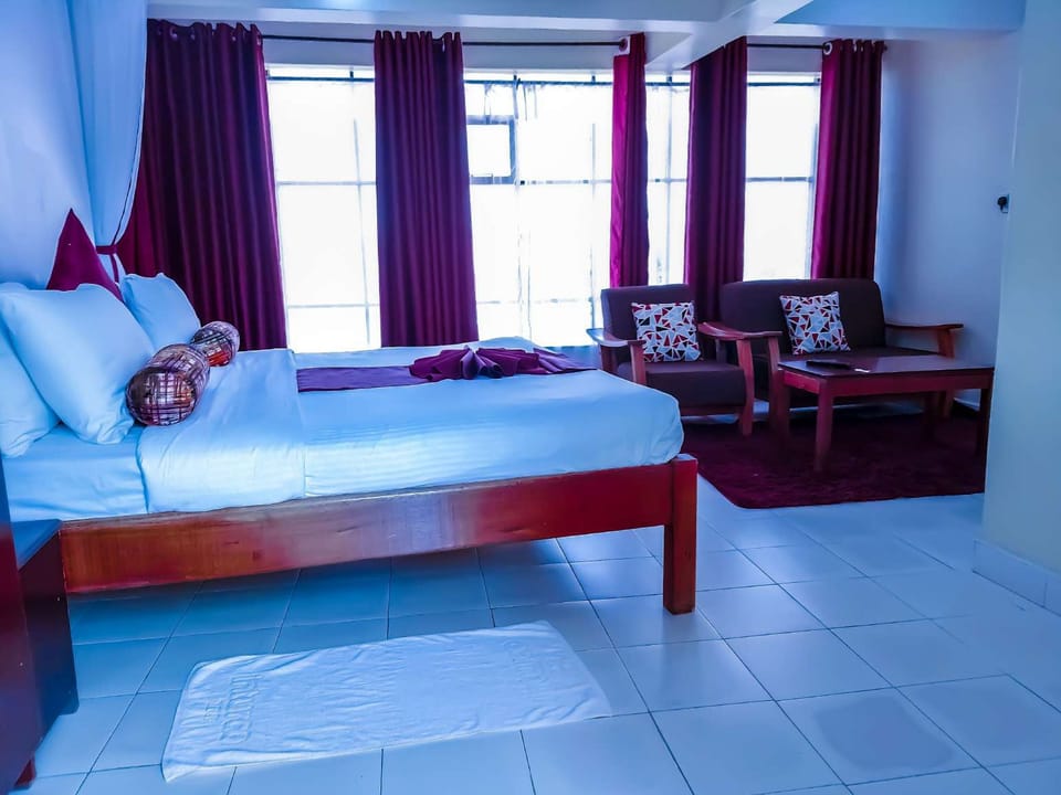 Executive Suite, Balcony, Garden View | In-room safe, desk, laptop workspace, soundproofing