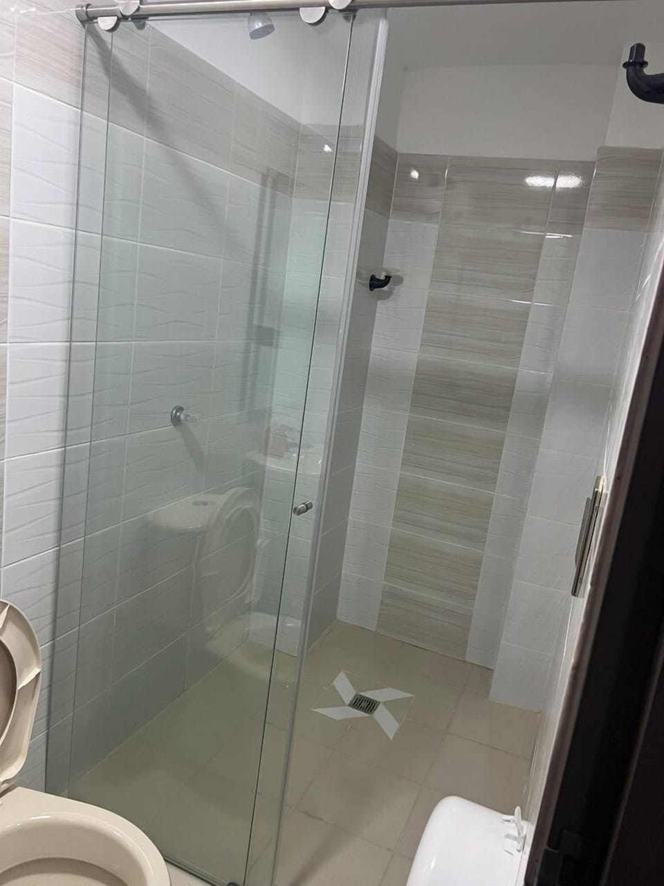 Basic Triple Room | Bathroom | Shower, towels, soap, toilet paper