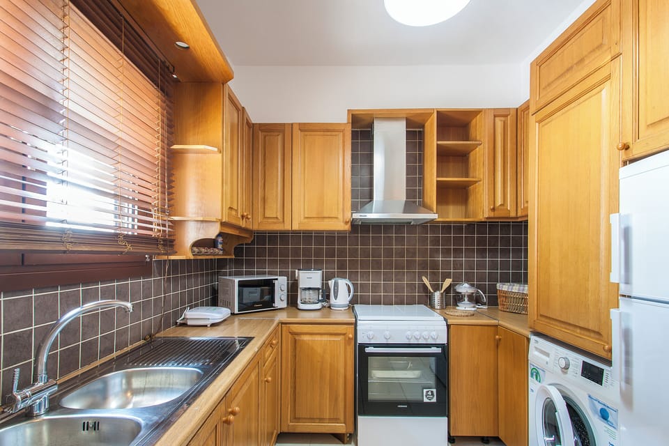 Standard Apartment | Private kitchen | Full-size fridge, microwave, oven, stovetop