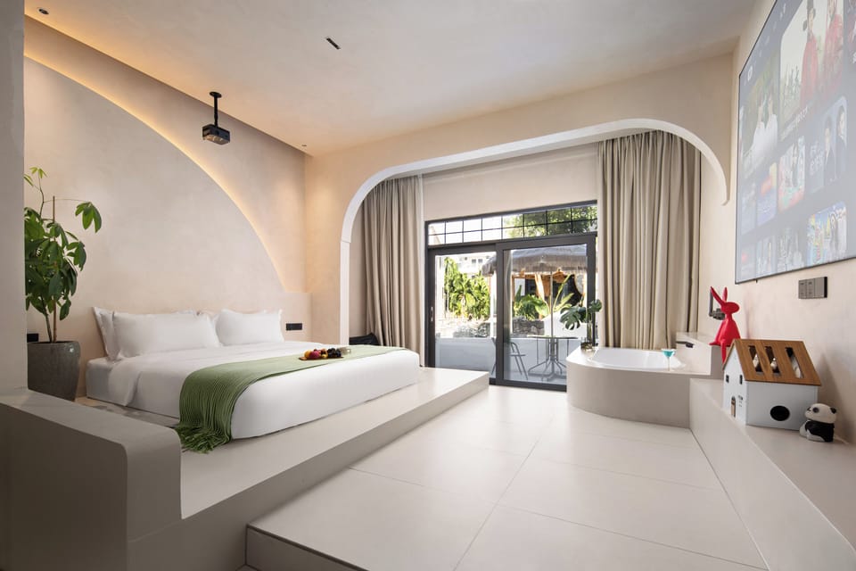 Deluxe Double Room, Patio, Courtyard View | Laptop workspace, blackout drapes, iron/ironing board (on request)