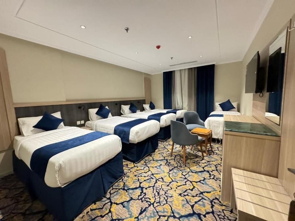 Quadruple Room | Bed sheets
