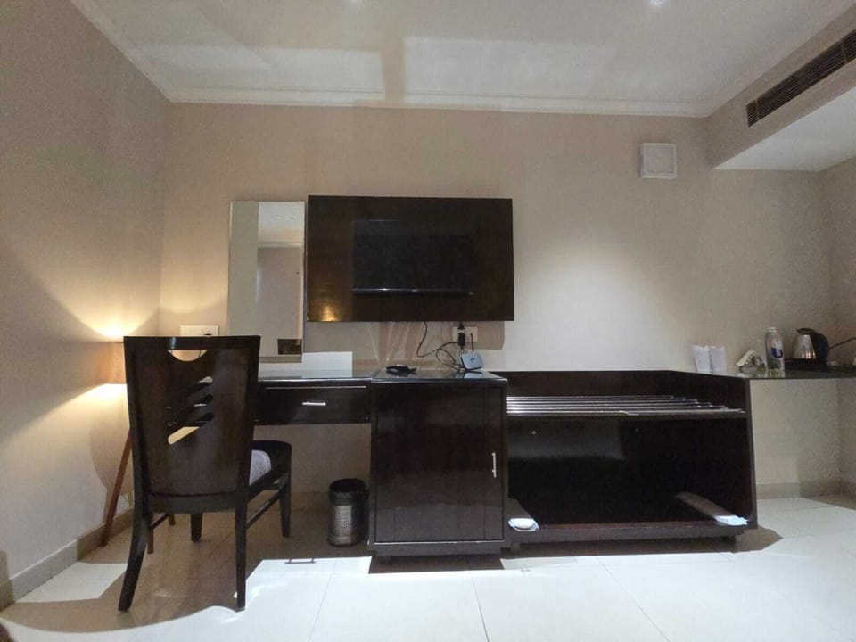 Premium bedding, desk, laptop workspace, soundproofing