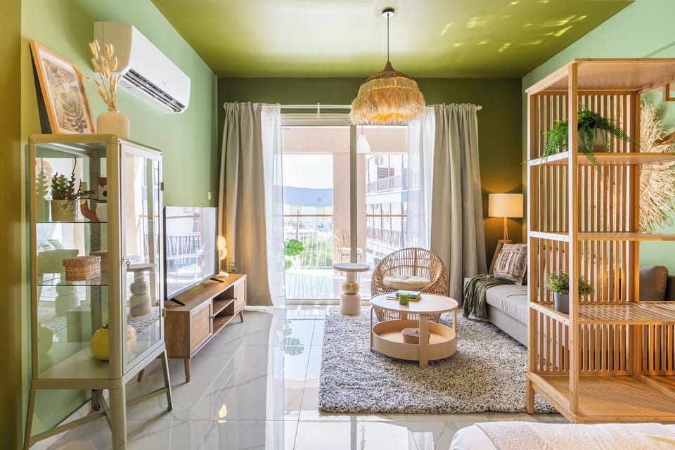 Studio, 1 Double Bed, Balcony, City View | Living area | 50-inch Smart TV with cable channels, streaming services