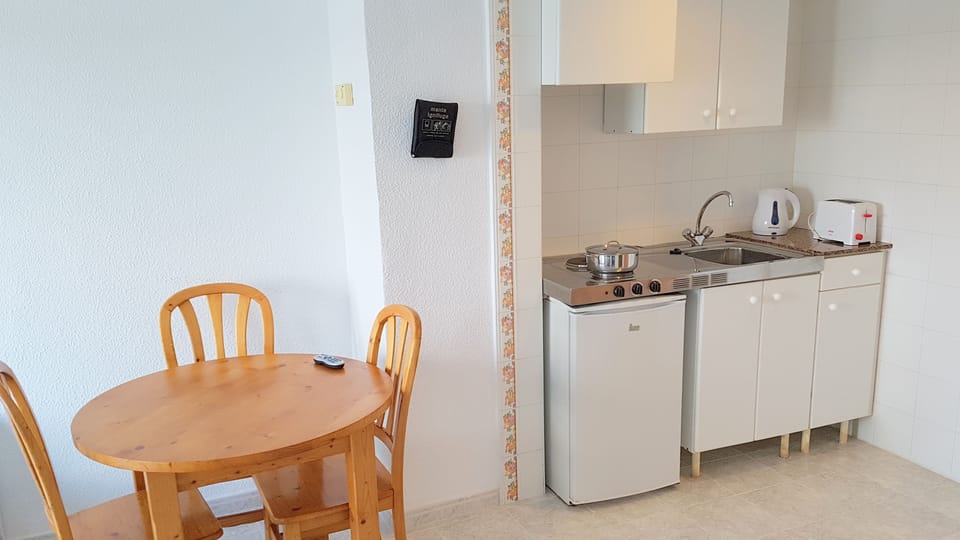 Apartment, 1 Bedroom, Balcony | Private kitchen | Full-size fridge, stovetop, electric kettle, cookware/dishes/utensils