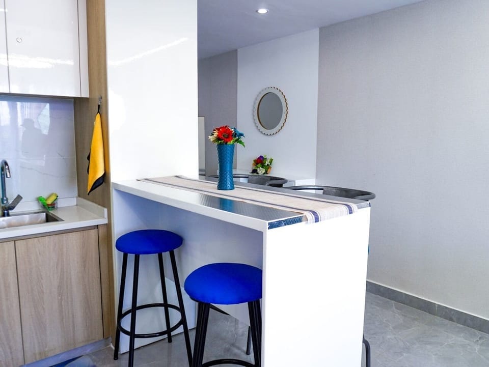 Fridge, microwave, cookware/dishes/utensils