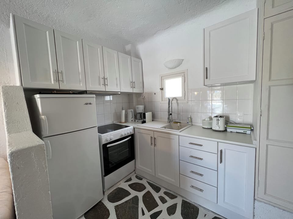 Premium Condo, Kitchen, Sea View | Private kitchenette