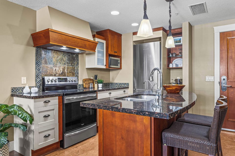 Family Condo, 2 Bedrooms, Balcony | Private kitchen | Coffee/tea maker, electric kettle