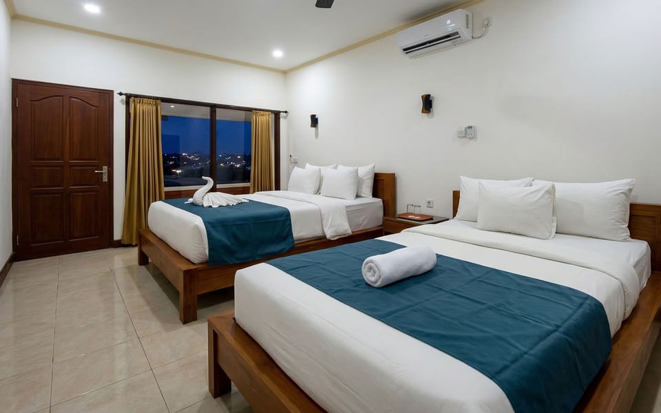 Deluxe Triple Room, Balcony | Free WiFi