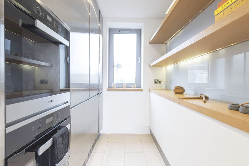 Penthouse, Balcony, City View | Private kitchen | Highchair