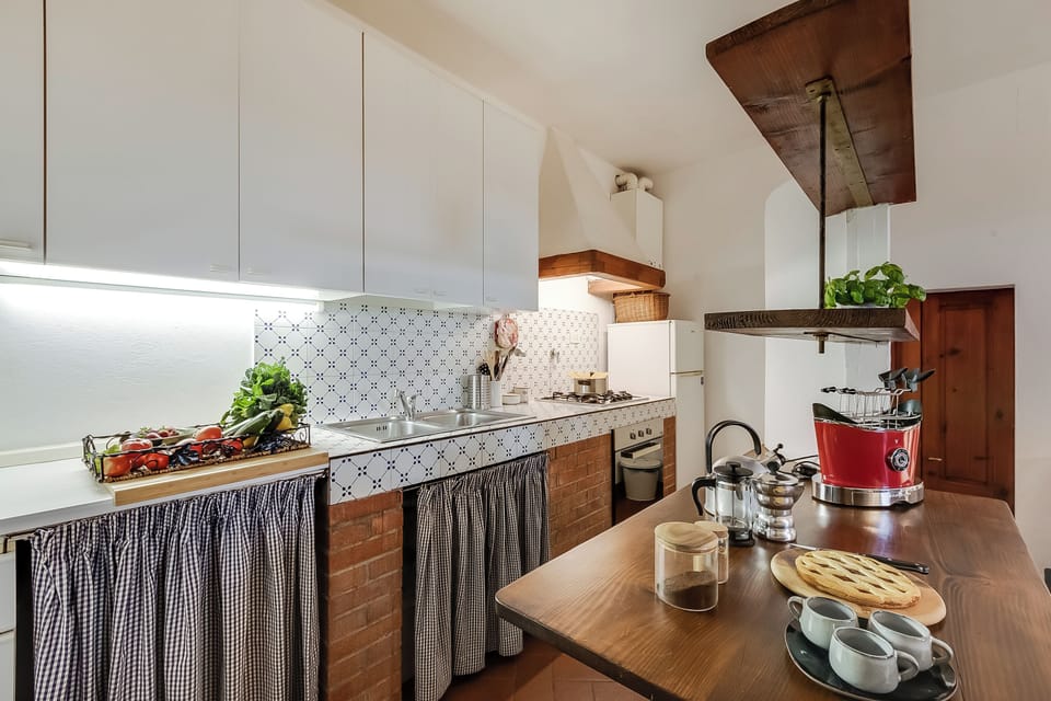 Family Apartment, 1 Bedroom, Fireplace, Mountainside (Relaxing Tuscan Terrazza near) | Private kitchen | Fridge, oven, stovetop, coffee/tea maker