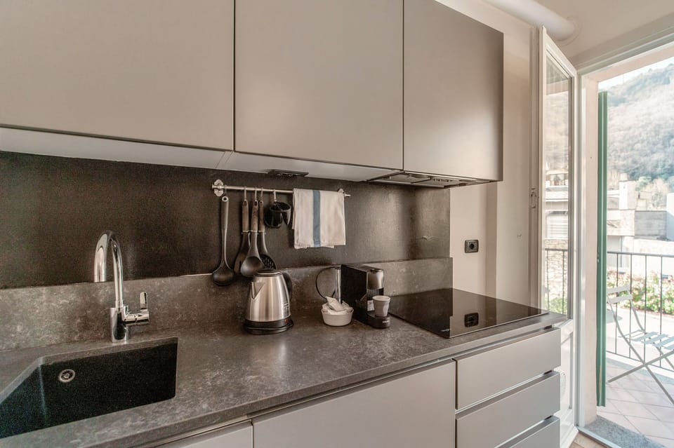 Apartment | Private kitchen | Full-size fridge, microwave, oven, stovetop